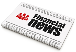 a newspaper with a headline text that says “financial news”.