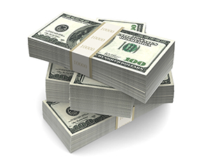 Stacks of cash showing $100 bills.